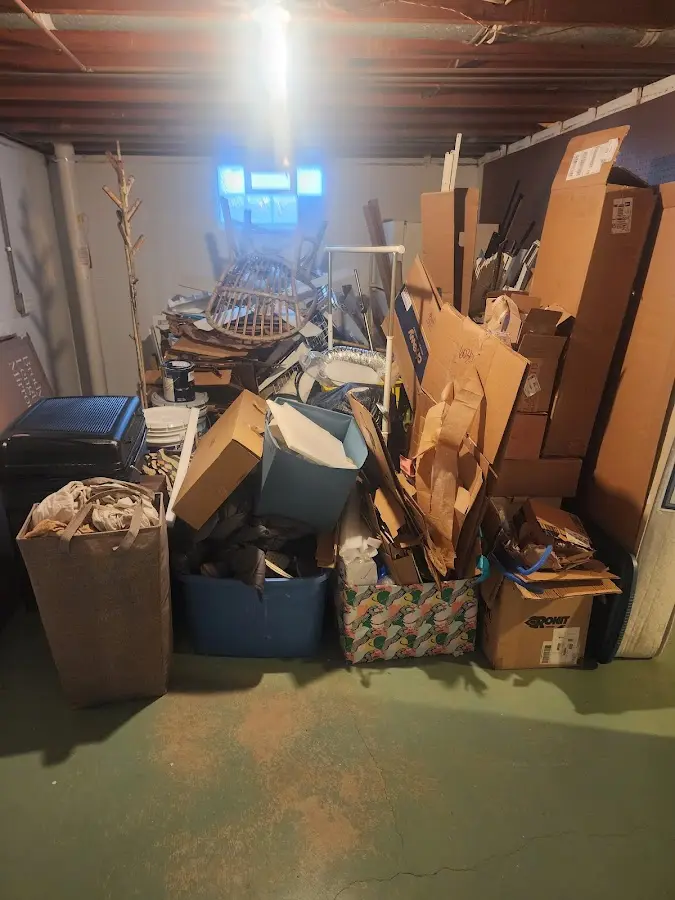 Roll-off dumpster container at job site for 20 Yard Dumpster Rental in Fort Payne